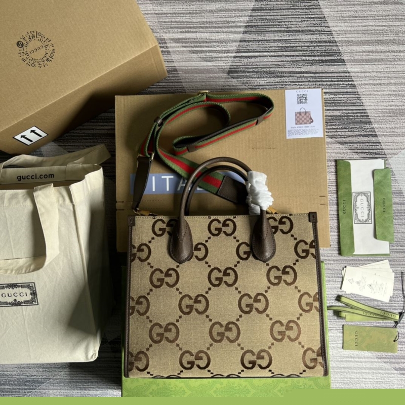 G*u*i shopping bags